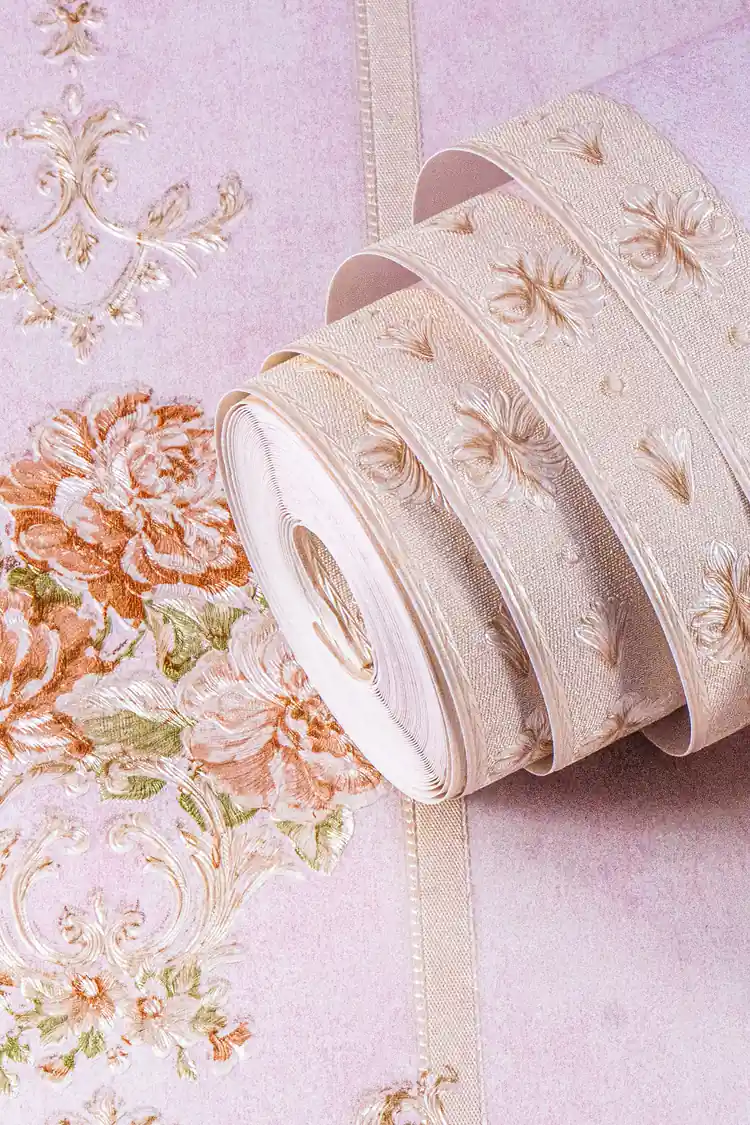 Rolled pink floral stripe wallpaper showing rose bouquets between embossed vertical stripes on pastel base
