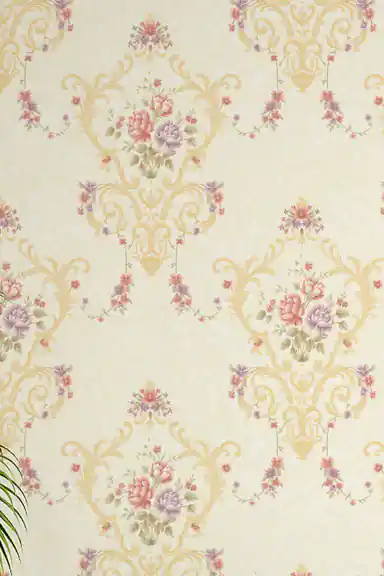 Full pattern view of cream wallpaper showing rose bouquets in gold cartouche frames on ivory background