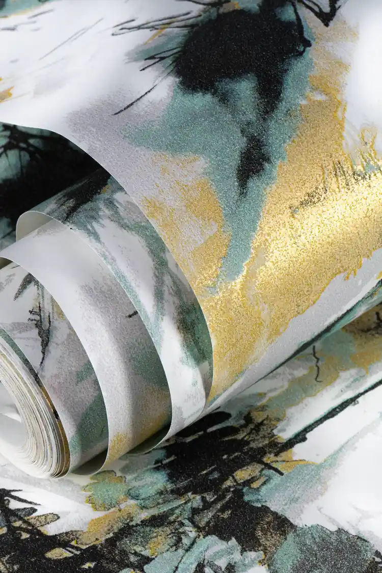 Rolled abstract mountain wallpaper showing ink-wash pine trees and peaks with gold metallic accents