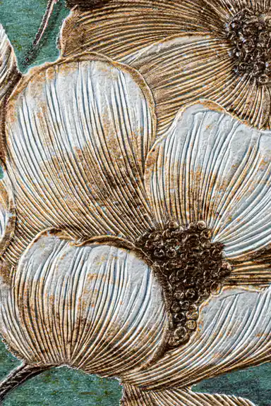 Extreme macro of deeply embossed white magnolia petal texture with brown edge detail on teal wallpaper