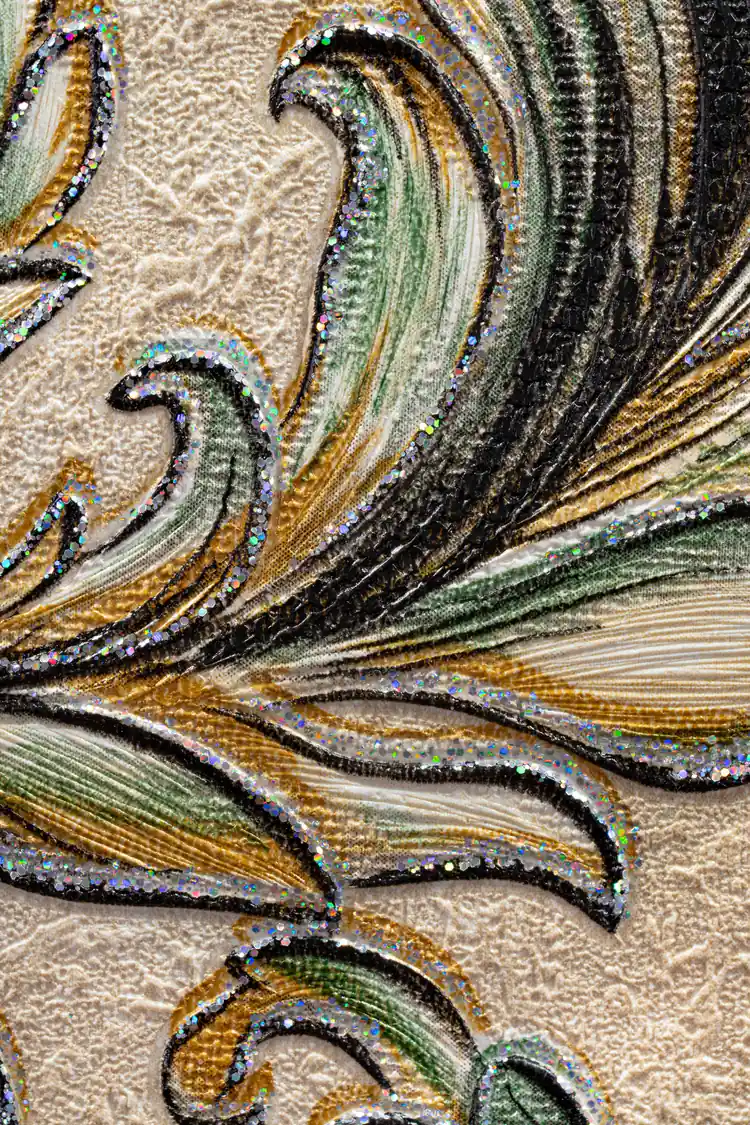 Extreme macro of embossed holographic damask wallpaper texture with gold and green swirl accents