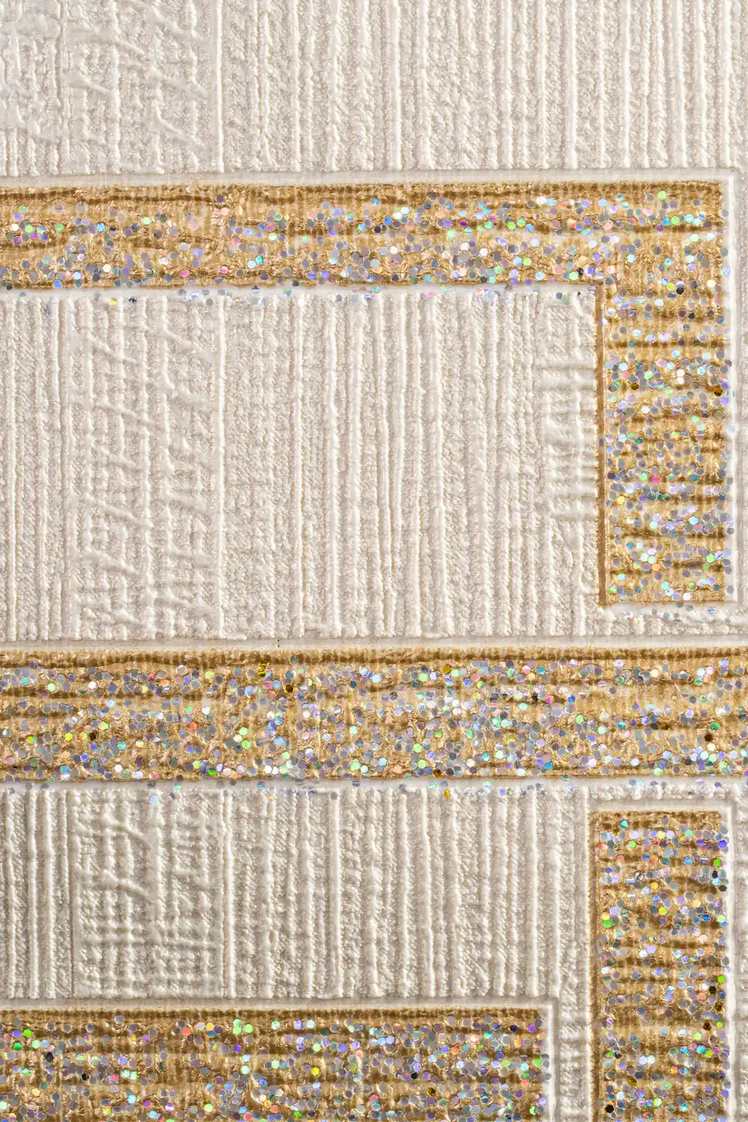 Extreme macro of textured white wallpaper with gold holographic glitter square borders