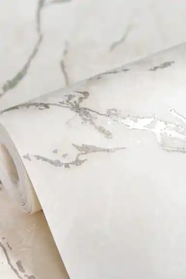 White Carrara marble wallpaper roll with delicate silver shimmer veins on pristine white base