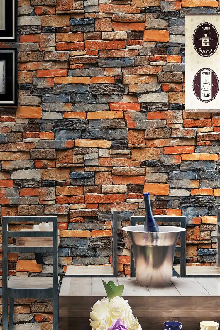 Full wall view of stacked multicolor stone effect wallpaper in a restaurant setting with seating area