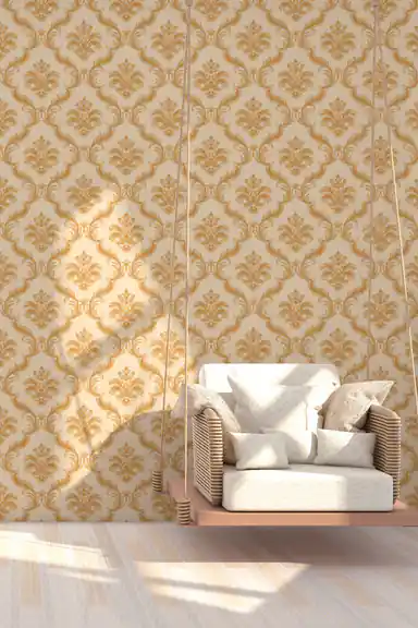 Elegant room scene with gold damask wallpaper behind a hanging swing chair on light wooden flooring