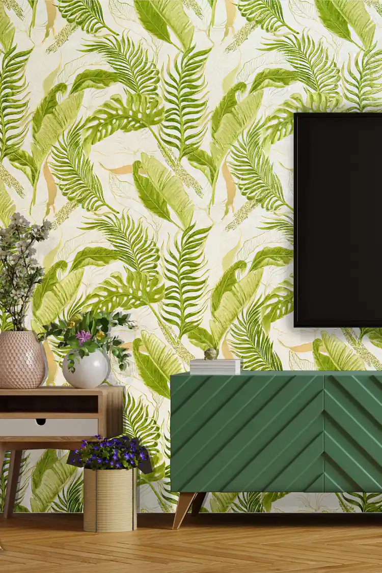 Living room scene with lush green palm frond wallpaper behind a teal media console and flower vases