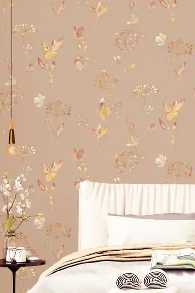 Bedroom corner with warm-toned botanical leaf wallpaper, pendant light, and white bedding