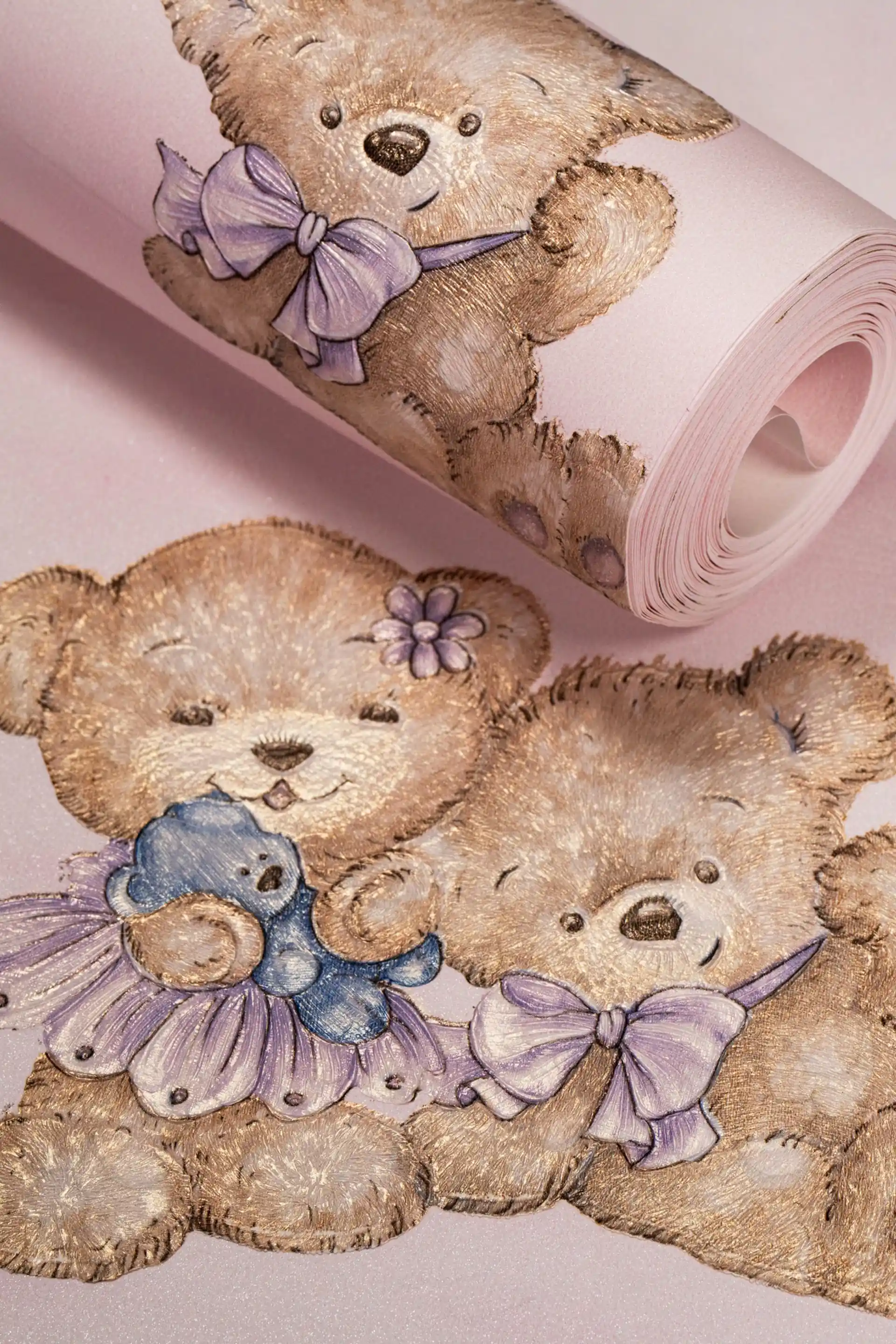 Wallpaper roll featuring cute teddy bears with purple bows on a soft pink background for kids rooms