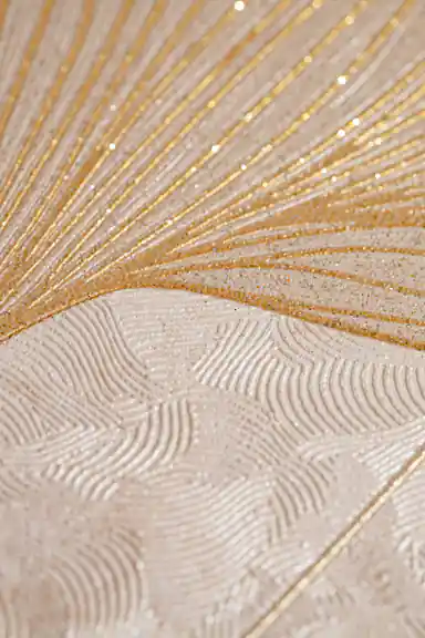 Extreme close-up of beige wallpaper texture showing gold glitter veins radiating through a ginkgo leaf