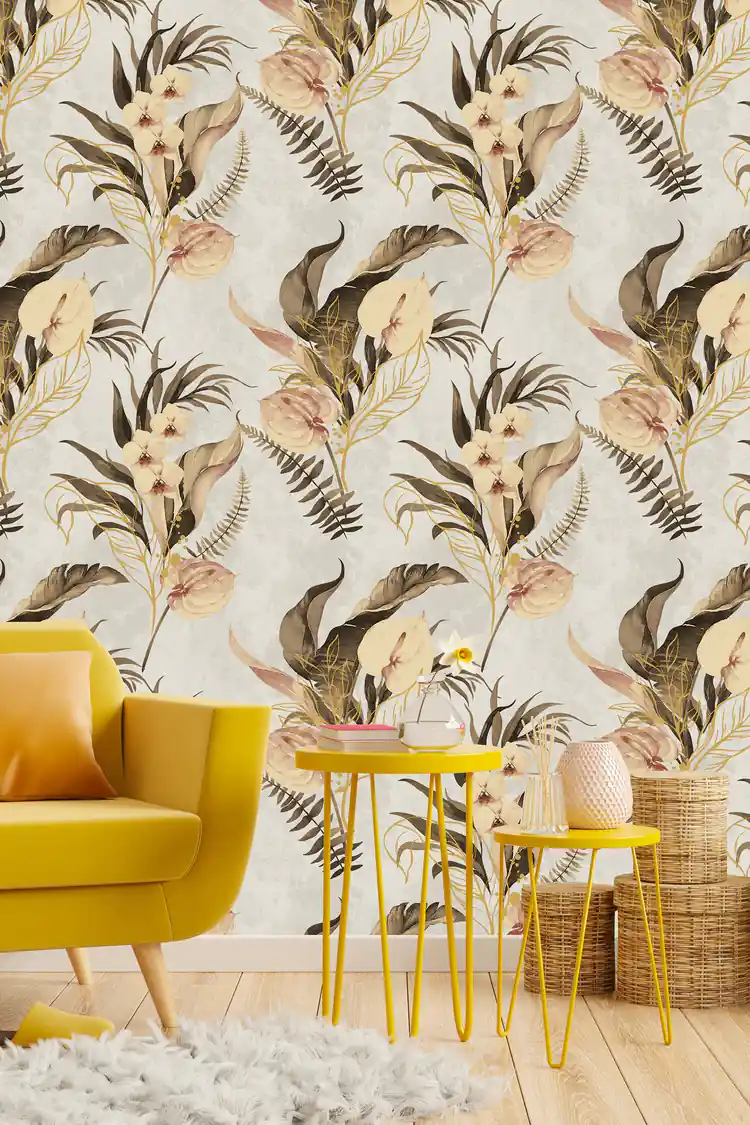 Tropical orchid and ferns wallpaper in a bright living room with a yellow armchair and rattan decor
