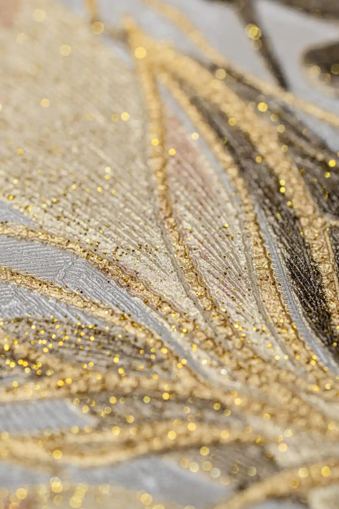 Extreme close-up of copper and gold glitter details on tropical leaf and orchid wallpaper texture