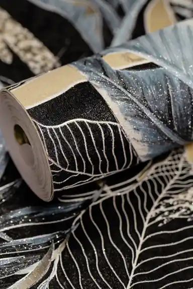 Rolled dark wallpaper featuring midnight jungle banana leaves in blue and black with glitter shimmer