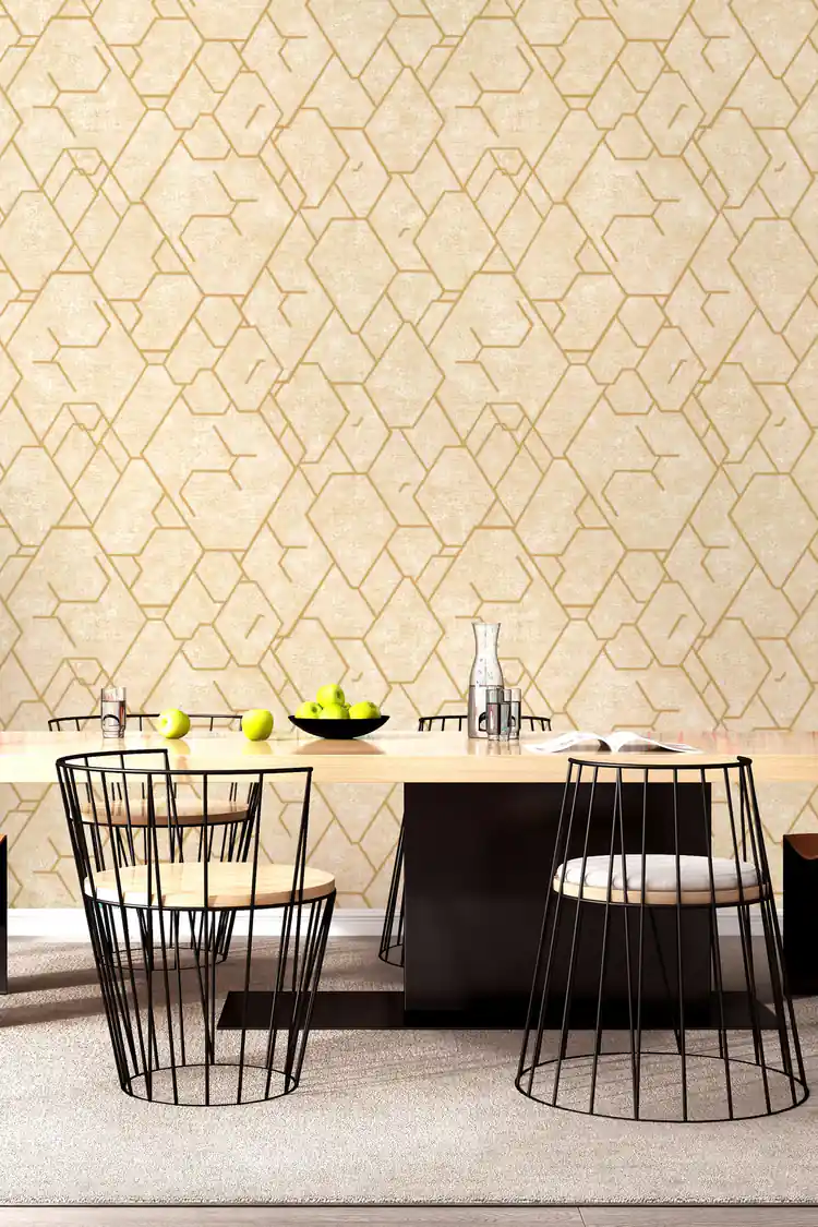 Geometric hexagonal wallpaper with gold lines in a modern dining room with black wire chairs and wooden table