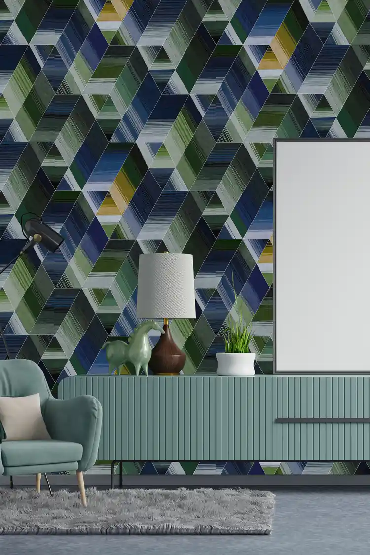 Blue and green 3D hexagon tile wallpaper in a modern living room with a teal armchair and green credenza