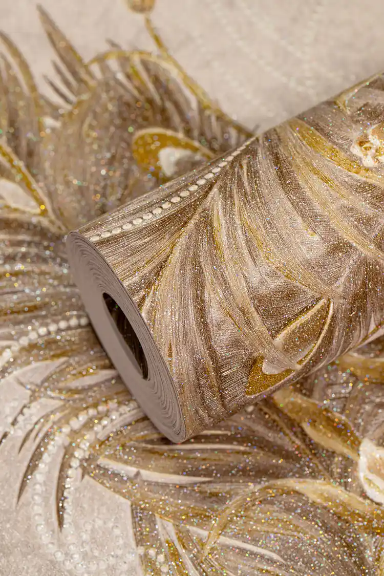 Full roll of beige peacock feather wallpaper with embossed gold and glitter detailing on floral motifs