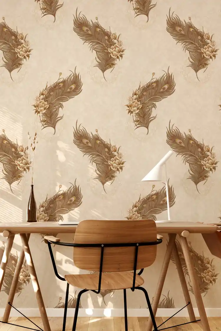 Beige peacock feather wallpaper installed in a home office setting with wooden desk and chair