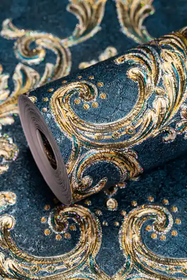 Full roll of deep teal damask wallpaper with ornate embossed gold scrollwork and glitter accents