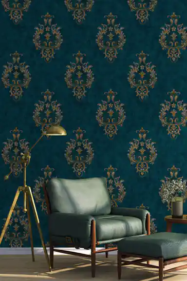 Teal damask wallpaper installed in a living room with green leather armchair and gold tripod lamp