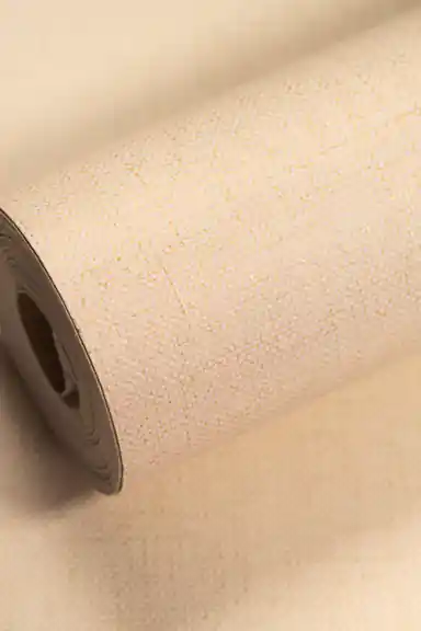 Full roll of cream grasscloth wallpaper with soft woven shimmer texture and gold thread accents