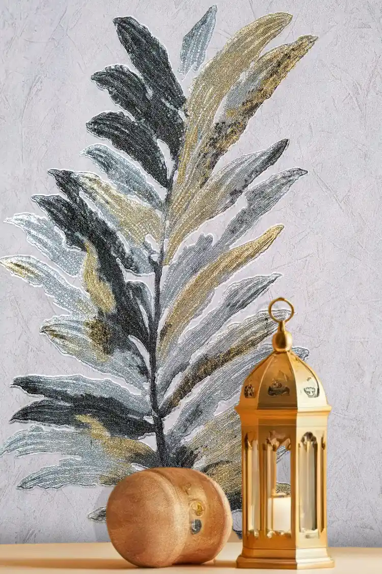 Close-up of charcoal fern leaf wallpaper with brass lantern showing detailed gold-tipped fronds