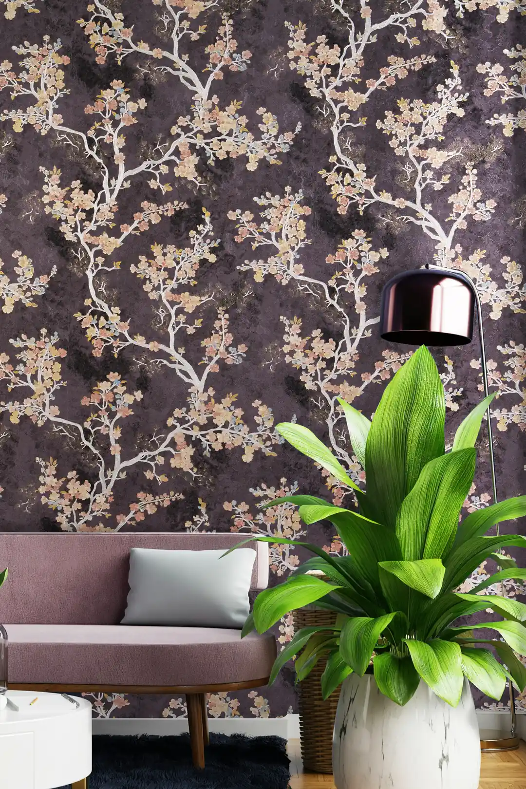 Cherry blossom wallpaper in a living room with mauve sofa, tropical plant, and pendant lamp