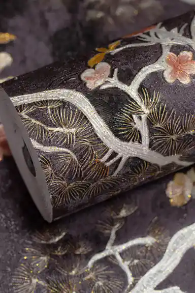 Full roll of midnight blossom wallpaper showing detailed cherry flowers and golden pine needles
