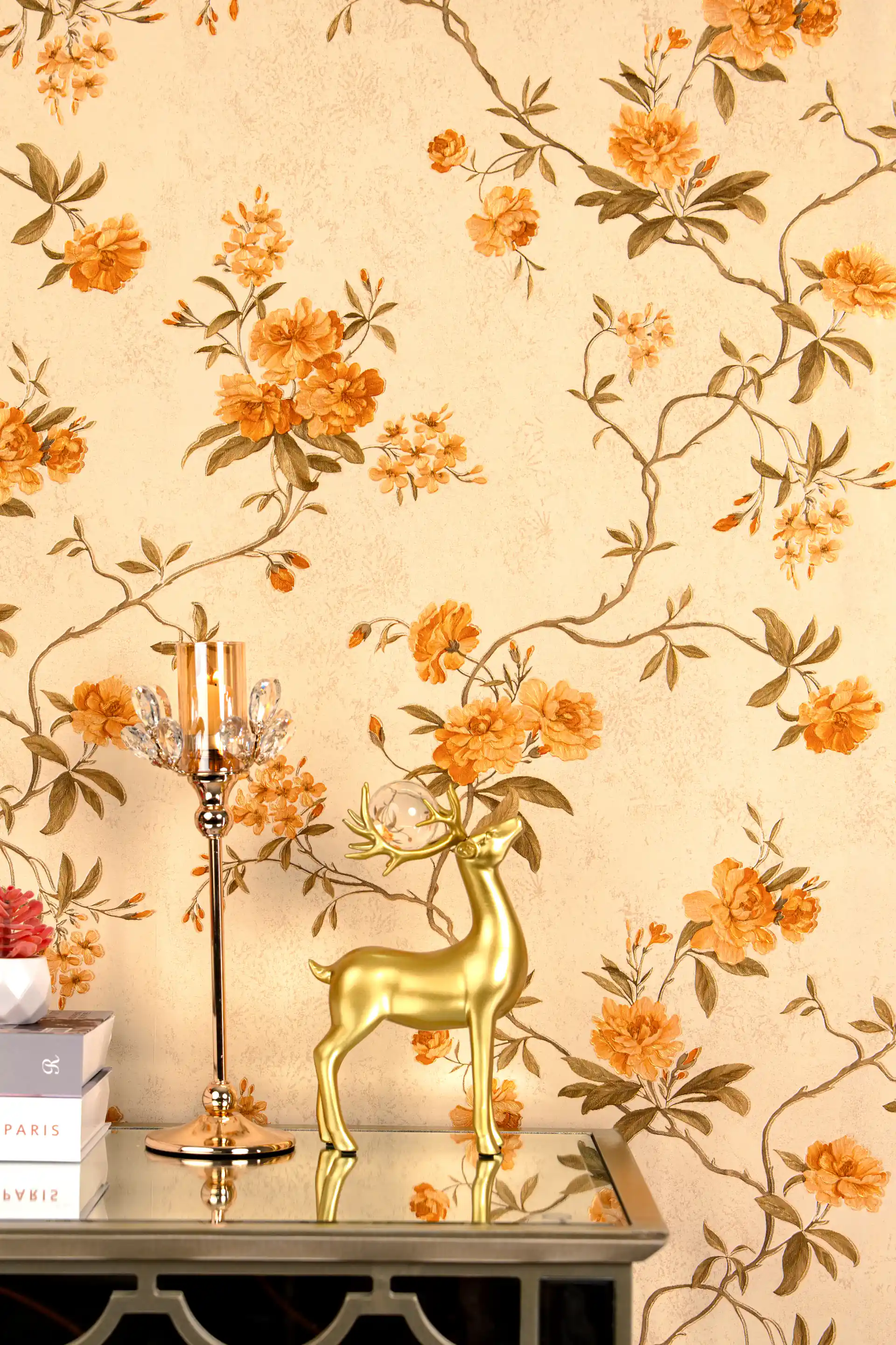 Installed wall featuring golden orange peony roses on trailing branches against a warm cream shimmer base