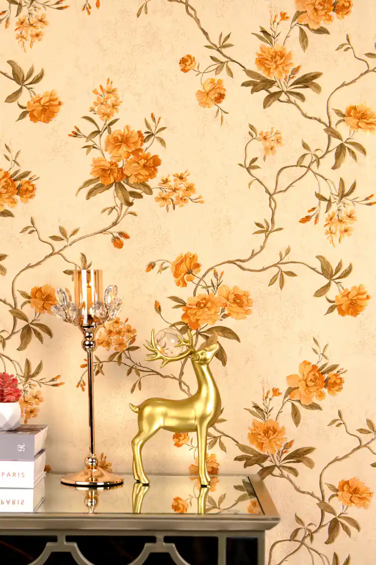 Installed wall featuring golden orange peony roses on trailing branches against a warm cream shimmer base