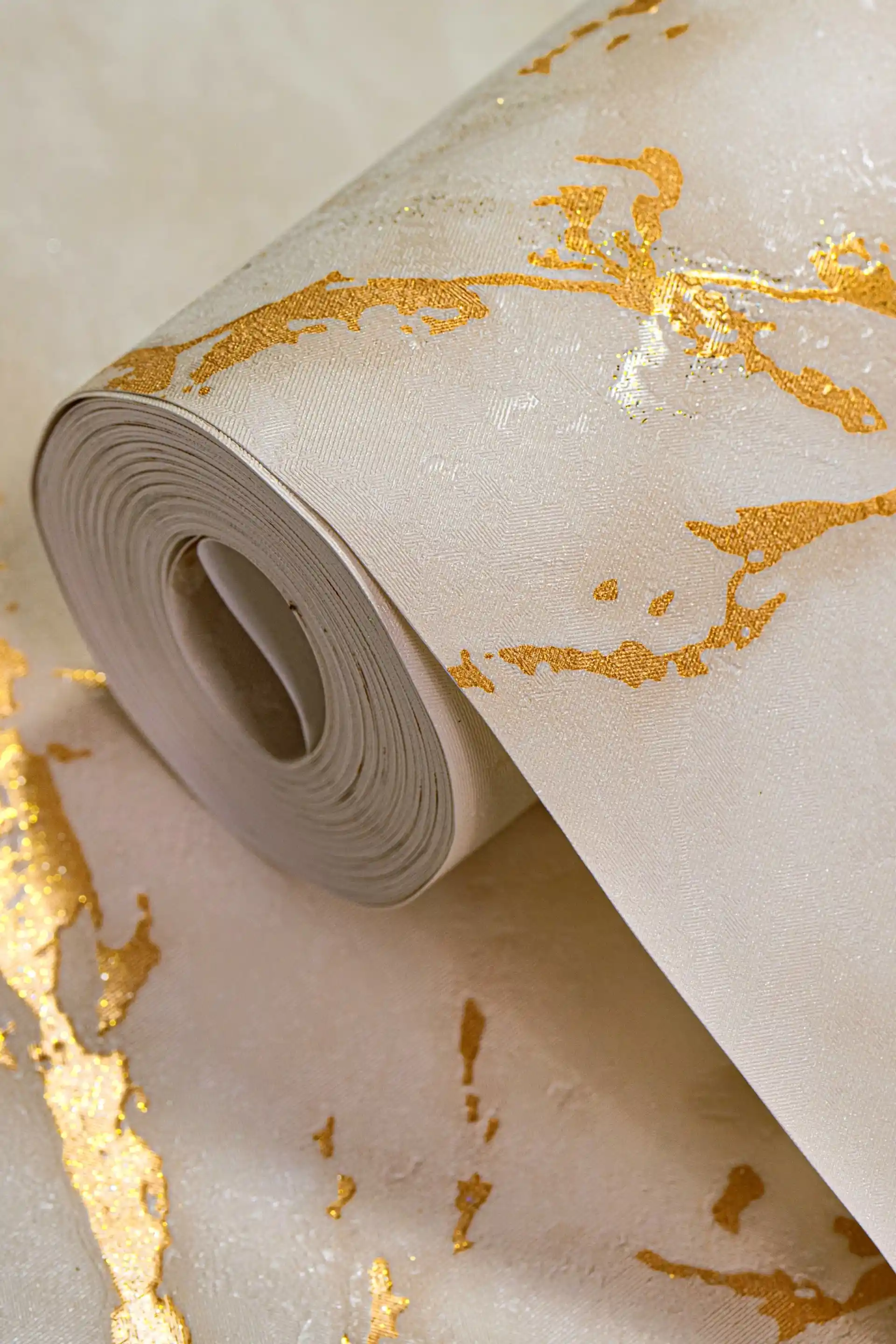 Carrara Beige Marble Effect Wallpaper with Golden Shimmer