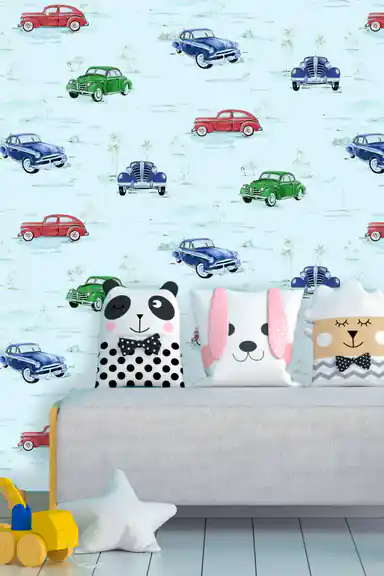 Kids playroom with vintage cars wallpaper behind grey sofa with cute animal cushions and toys