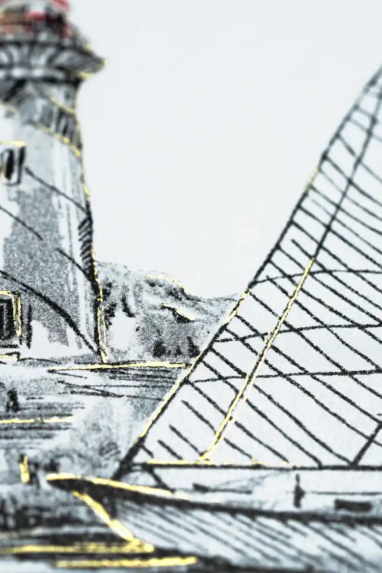 Extreme close-up of sketched lighthouse and sailboat sail detail with gold line accents