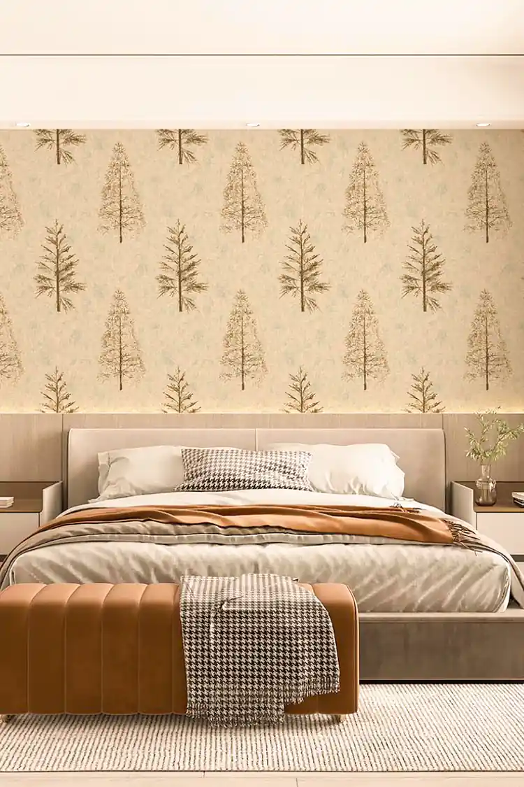 Modern bedroom with gold pine tree wallpaper on cream base behind upholstered bed with earth tones