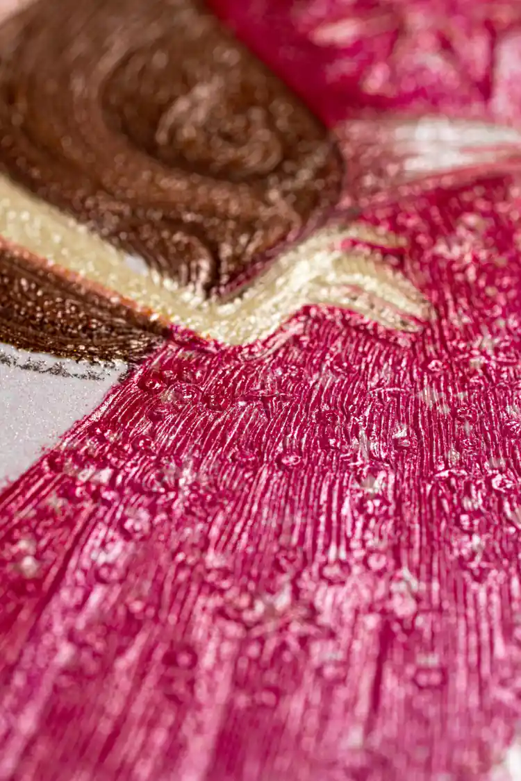 Extreme macro showing embossed texture detail of the princess dress with glitter and fine surface grain