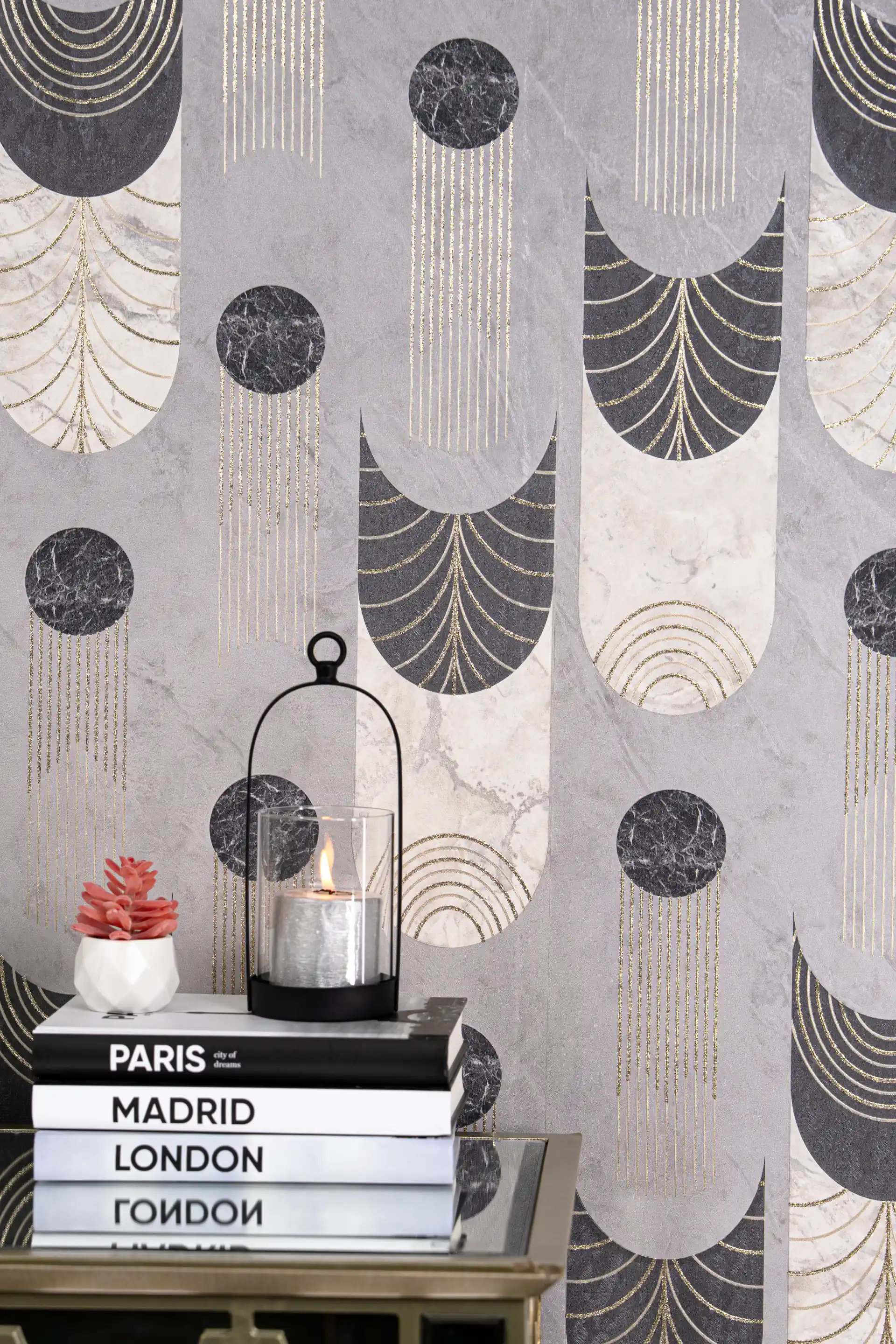 Grey art deco wallpaper with marble arch shapes, black circles, and cascading gold glitter lines