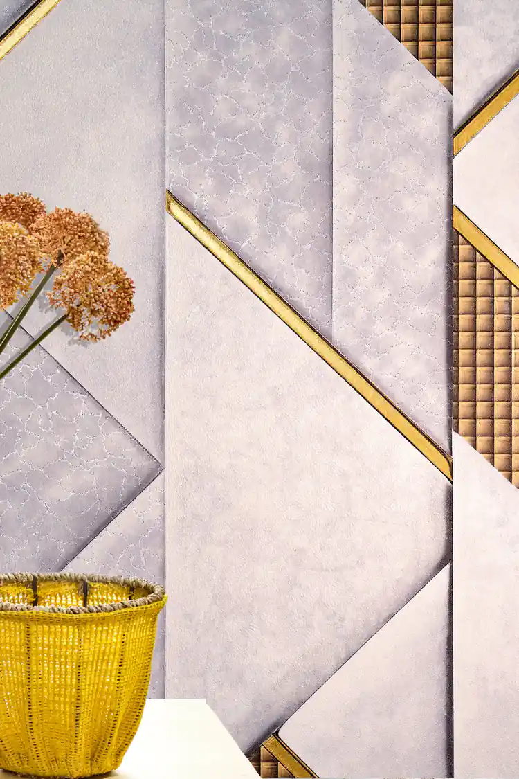 Close-up of grey and lavender geometric wallpaper with gold quilted grid panels behind a woven basket with dried flowers