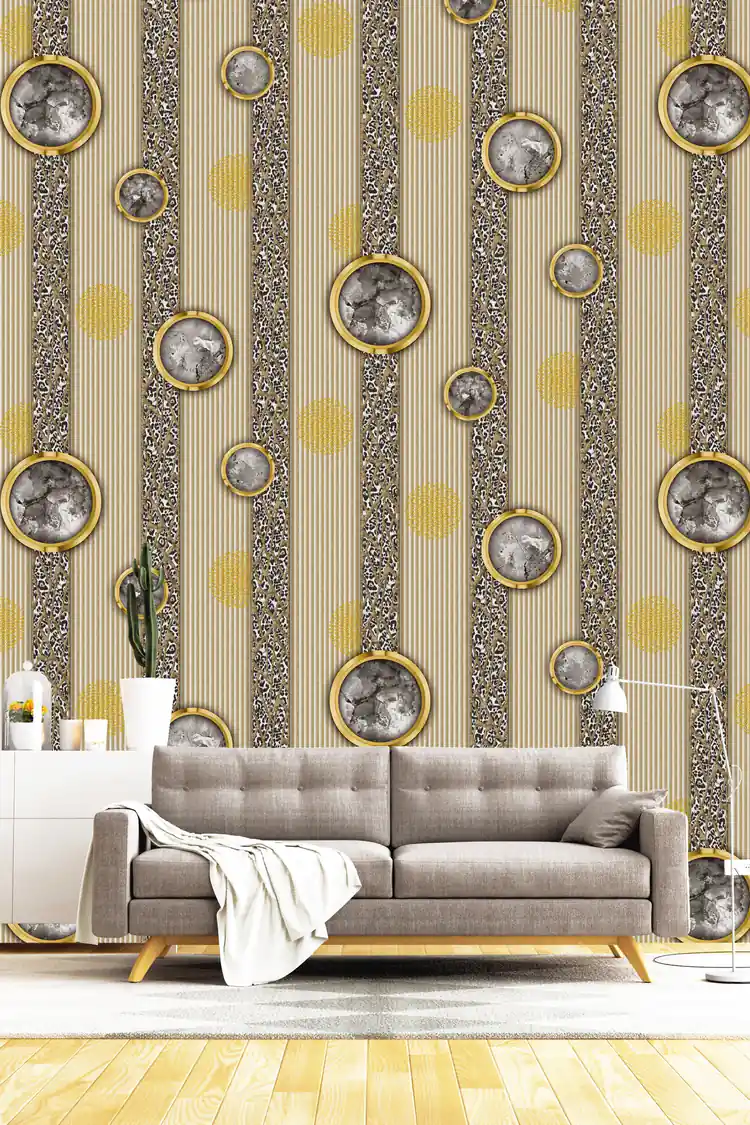 Cream and gold leopard stripe wallpaper installed in a living room with grey sofa and decorative circles