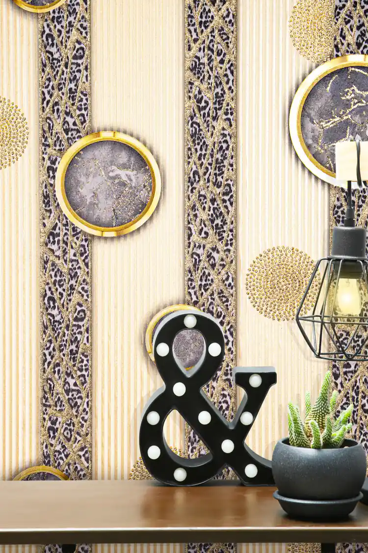 Close-up of installed wallpaper showing leopard print stripe, gold circles, and decorative accents on a shelf