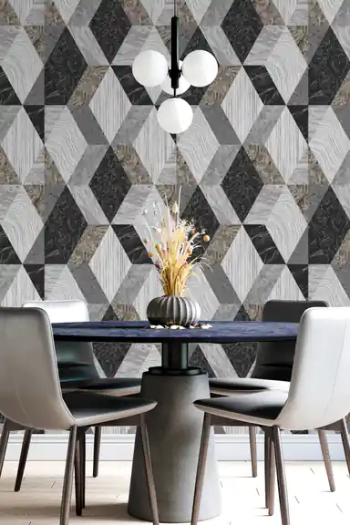 Grey marble 3D cube-effect geometric wallpaper in a modern dining room with round table and pendant light fixture