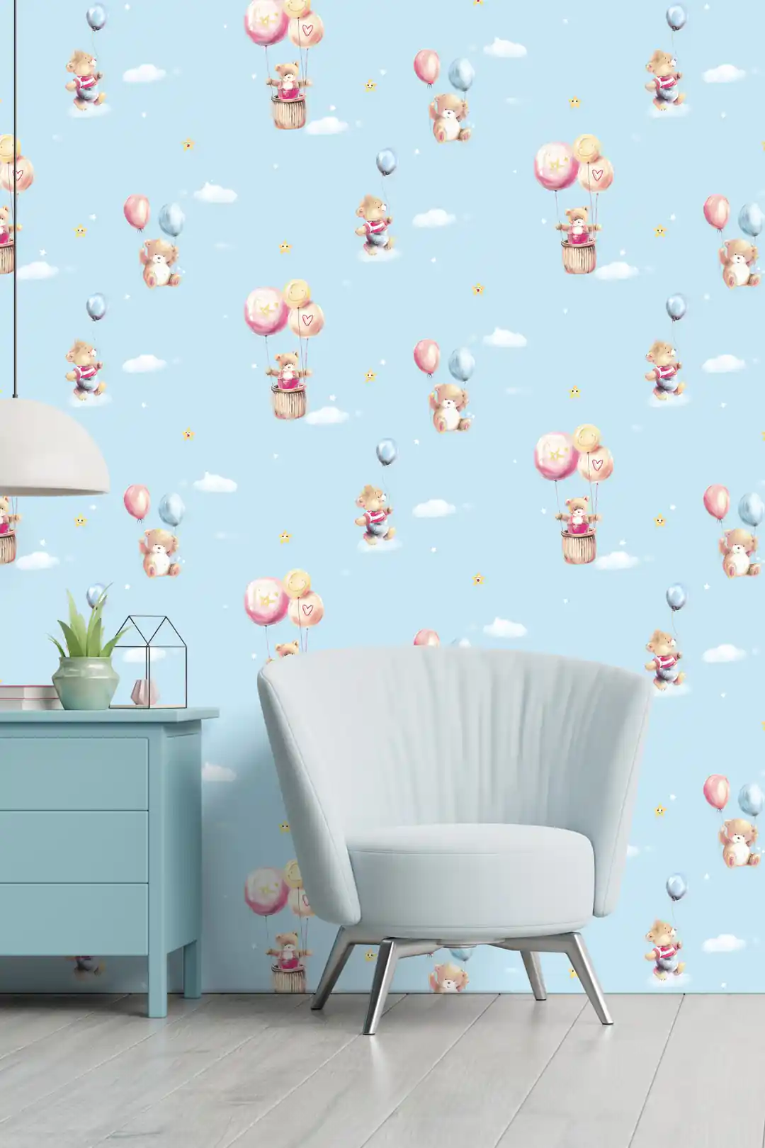 Teddy bears and balloons wallpaper installed in a children's room with teal chair and matching dresser