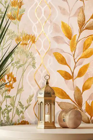 Close-up of golden fern trellis wallpaper with autumn-colored leaves beside a gold Moroccan lantern and wooden sphere on table
