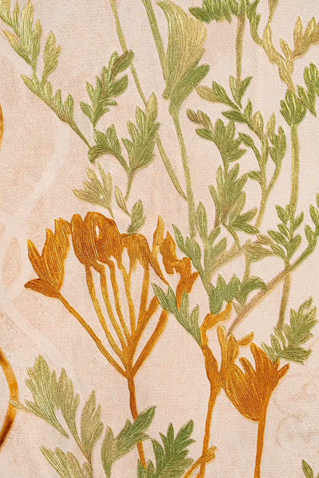Close-up of golden fern trellis wallpaper showing green botanical stems and golden-orange flower details