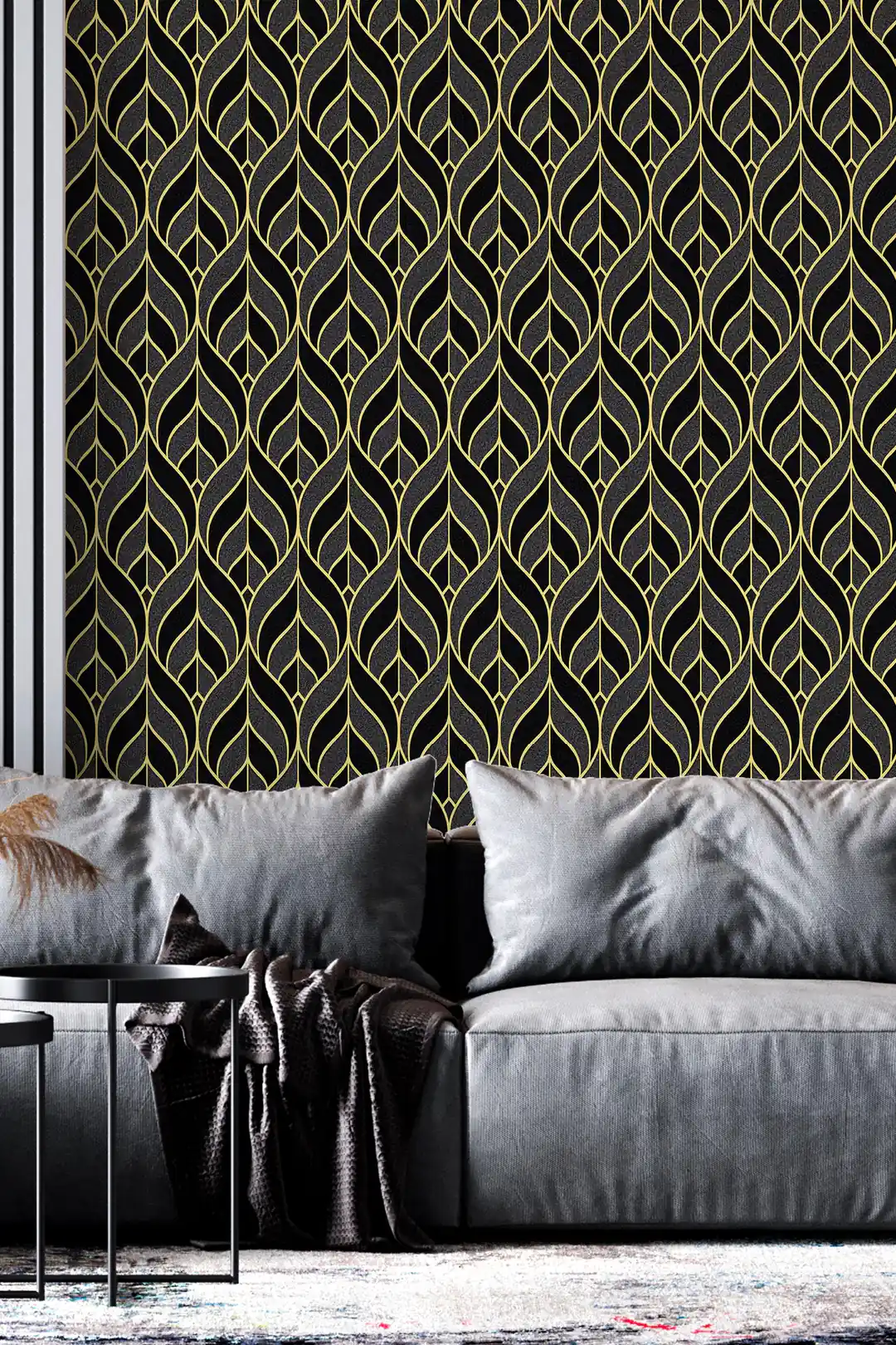 Black and gold leaf pattern wallpaper with elegant gold outlines on dark background in a modern living room with grey sofa