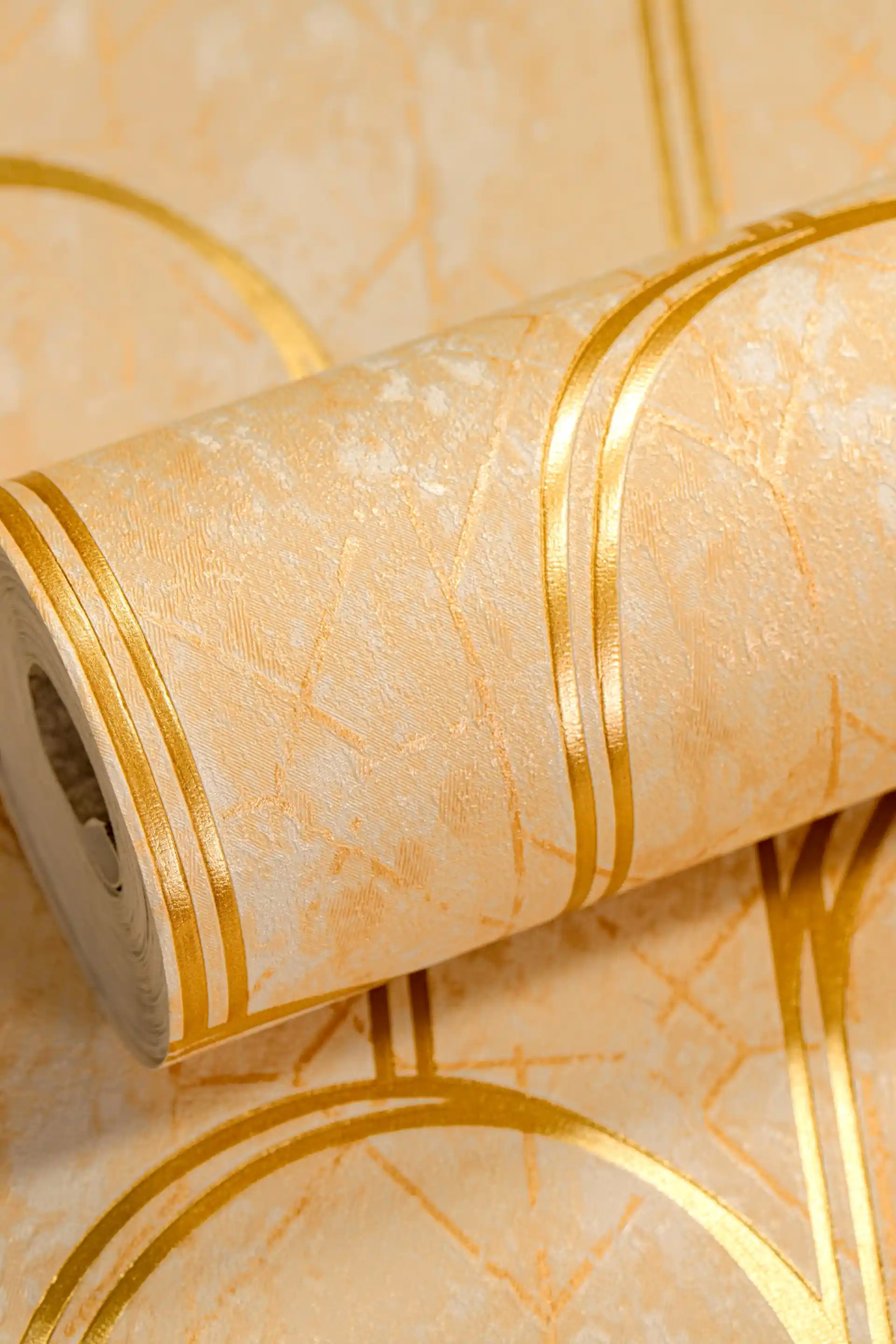 Rolled beige geometric arch wallpaper with gold metallic lines on textured marble-effect cream surface