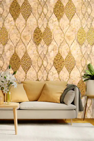 Living room with gold wave mosaic wallpaper behind a beige sofa with golden cushions and white lilies