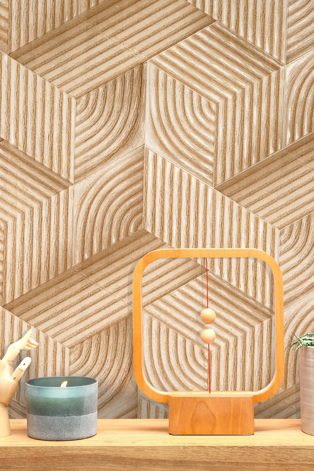 Styled shelf view of 3D wood grain hexagon pattern wallpaper with a decorative wooden lamp