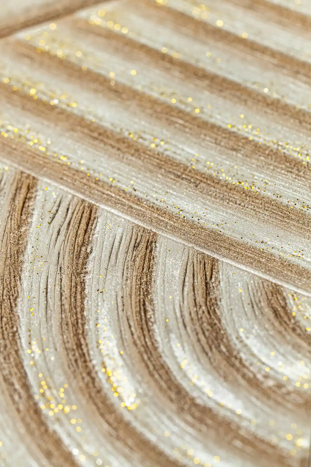 Extreme macro of glitter particles scattered across the curved wood grain texture lines