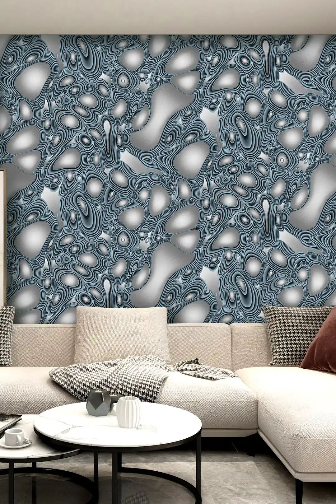 Modern living room with blue abstract molten steel wallpaper behind a cream sectional sofa