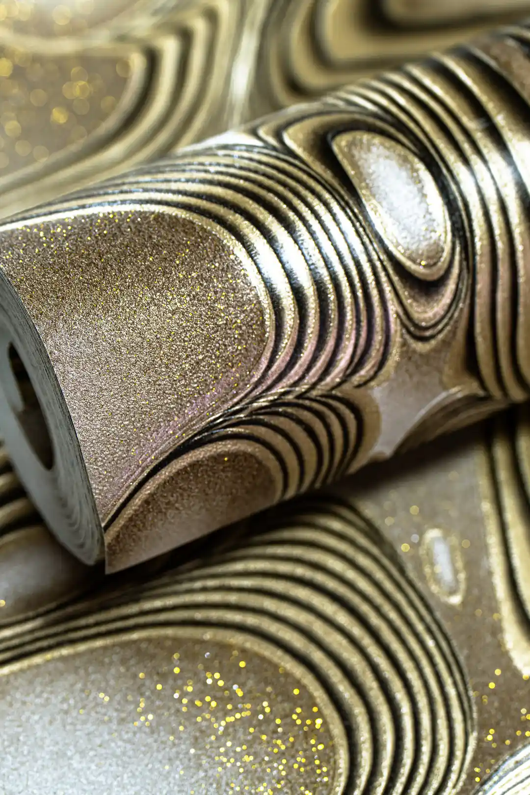 Rolled wallpaper with bronze molten metal flow pattern featuring black curves and golden glitter